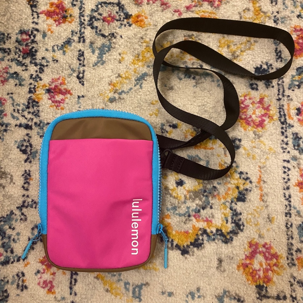 Pink, blue and brown Lululemon crossbody bag.